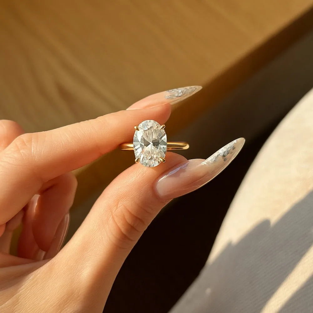 Elegant Oval Diamond Four-Claw Wedding Ring for Women 2026