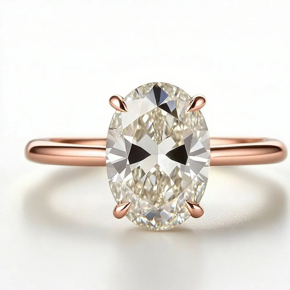 Elegant Oval Diamond Four-Claw Wedding Ring for Women 2026